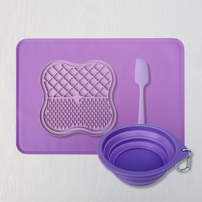 Elevate your pet's digestion and oral health with our Pet Slow Feeding Set, designed for puppies and small breeds. This set includes a collapsible drinking bowl, a textured licking plate for slower eating, and an anti-slip feeding mat for effortless cleaning.