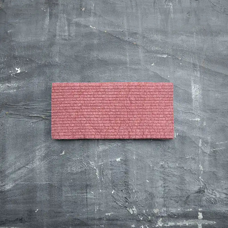 Red Swedish sponge cloth for kitchen cleaning.