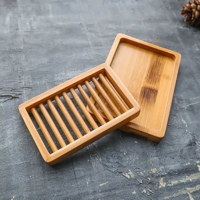 Natural bamboo dual layer soap holder for solid soap bar.