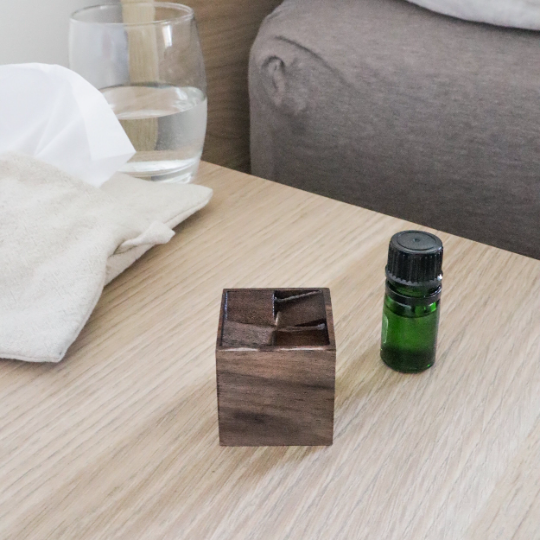 Wooden Essential Oil Diffuser for Home on bedside table side view