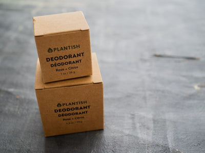 Plantish Future Beauty and Bathroom Zero Waste Deodorant Bar - Front View: 1 one ounce Rose & Citrus deodorant bar on top of 1 3.5 ounce Rose & Citrus in kraft paper boxes