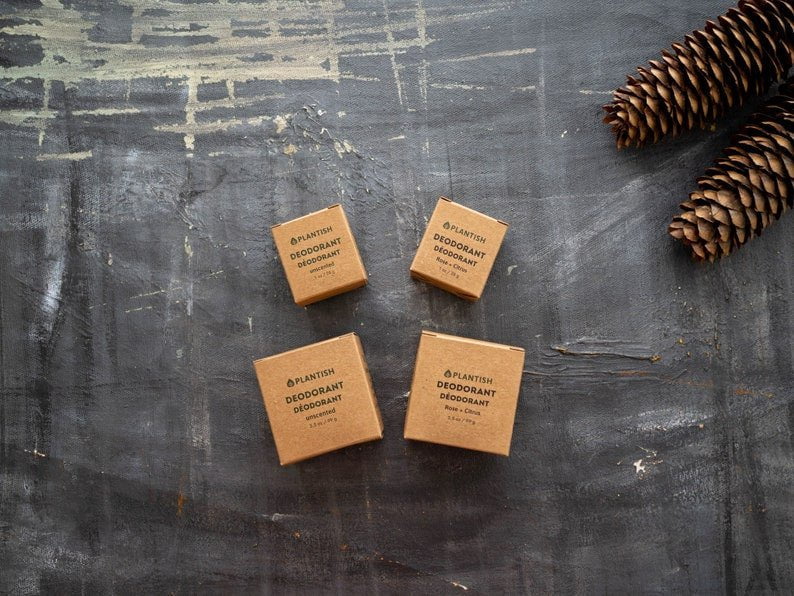 Plantish Future Beauty and Bathroom Zero Waste Deodorant Bar - Top View: Rose & Citrus and Unscented deodorant bars mini and full in kraft paper boxes